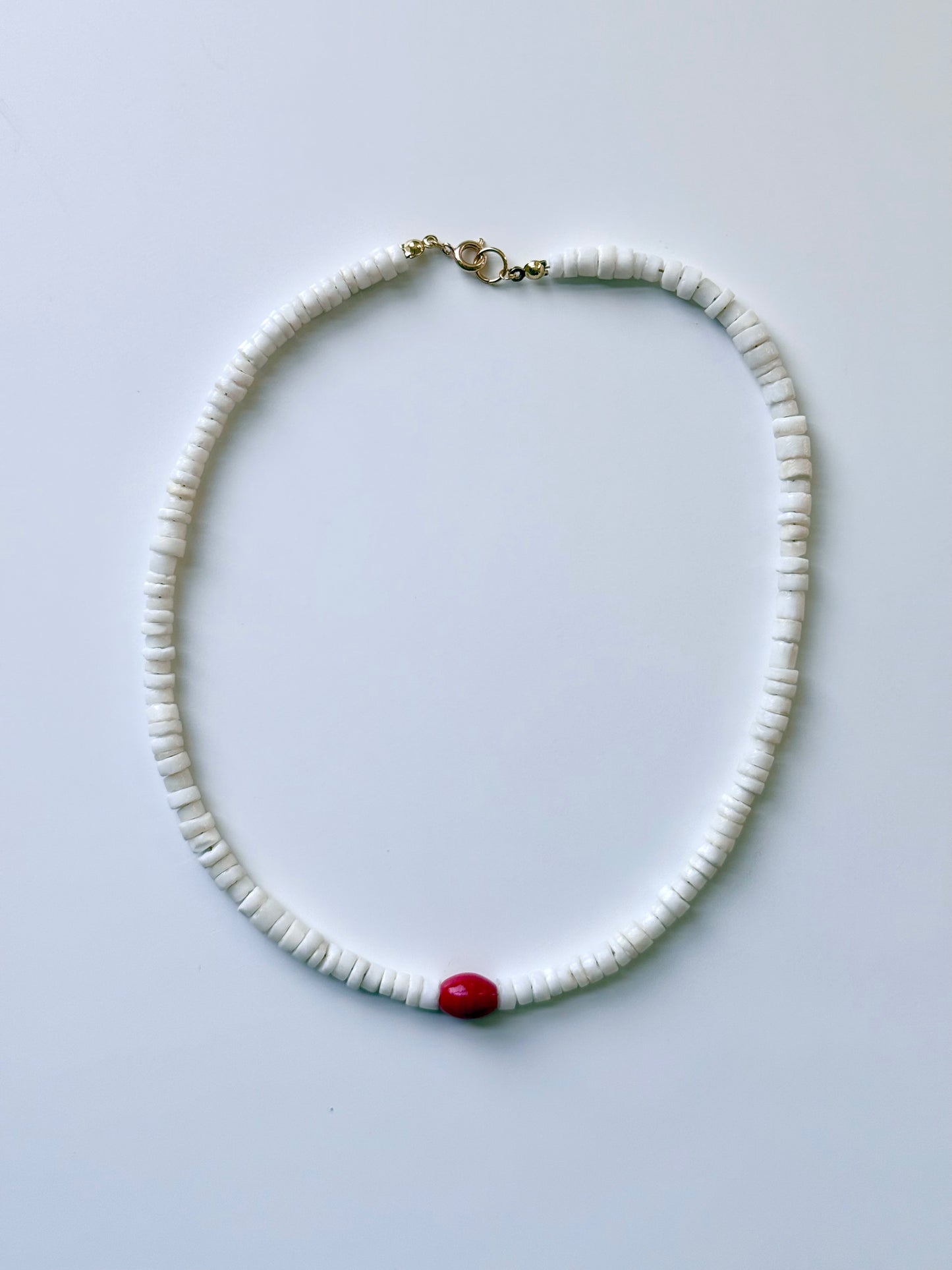WHITE PUKA + RED CENTER
