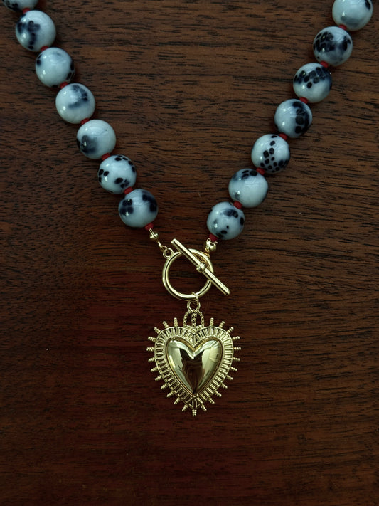 SNAKE GLASS AND RED BEADED HEART