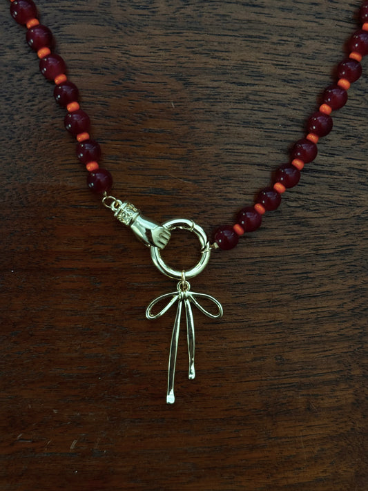 RED AND ORANGE BEADED BOW